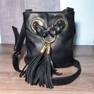 MICHAEL KORS Grommet Braided Tassel Crossbody